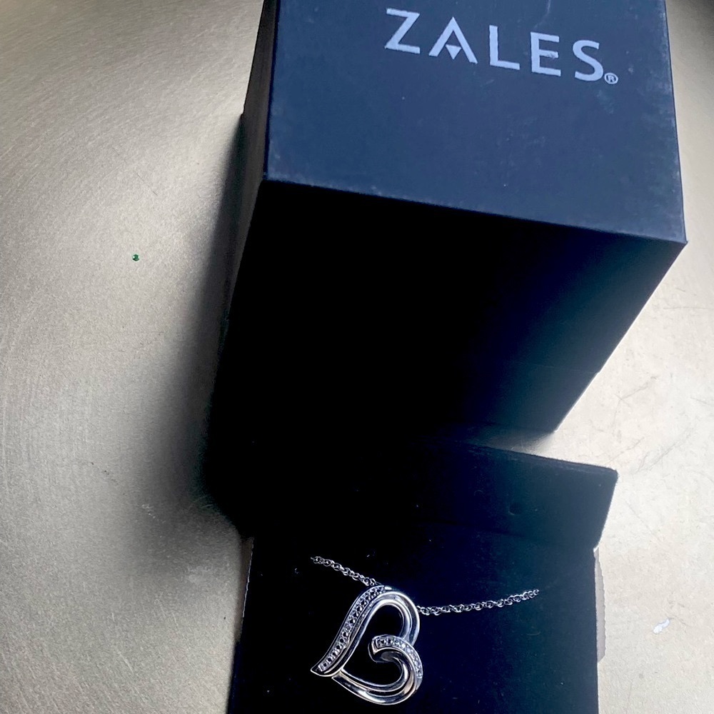 Zales Diamond Tilted Ribbon Heart Pendant in Sterling Silver